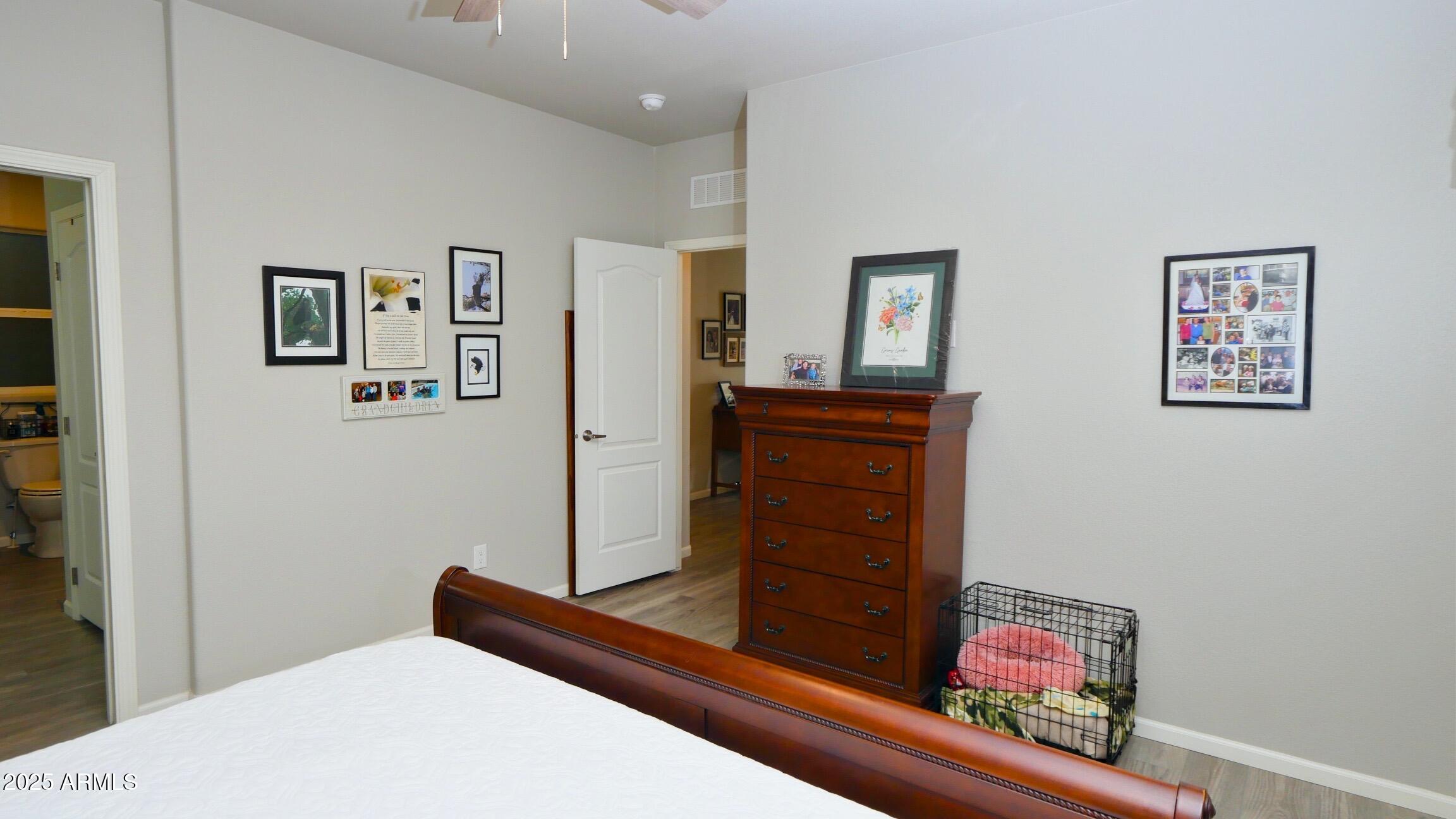 2929 East Main Street, Unit 116 Mesa, AZ 85213 - Photo 20 of 39 a hallway with dresser and window
