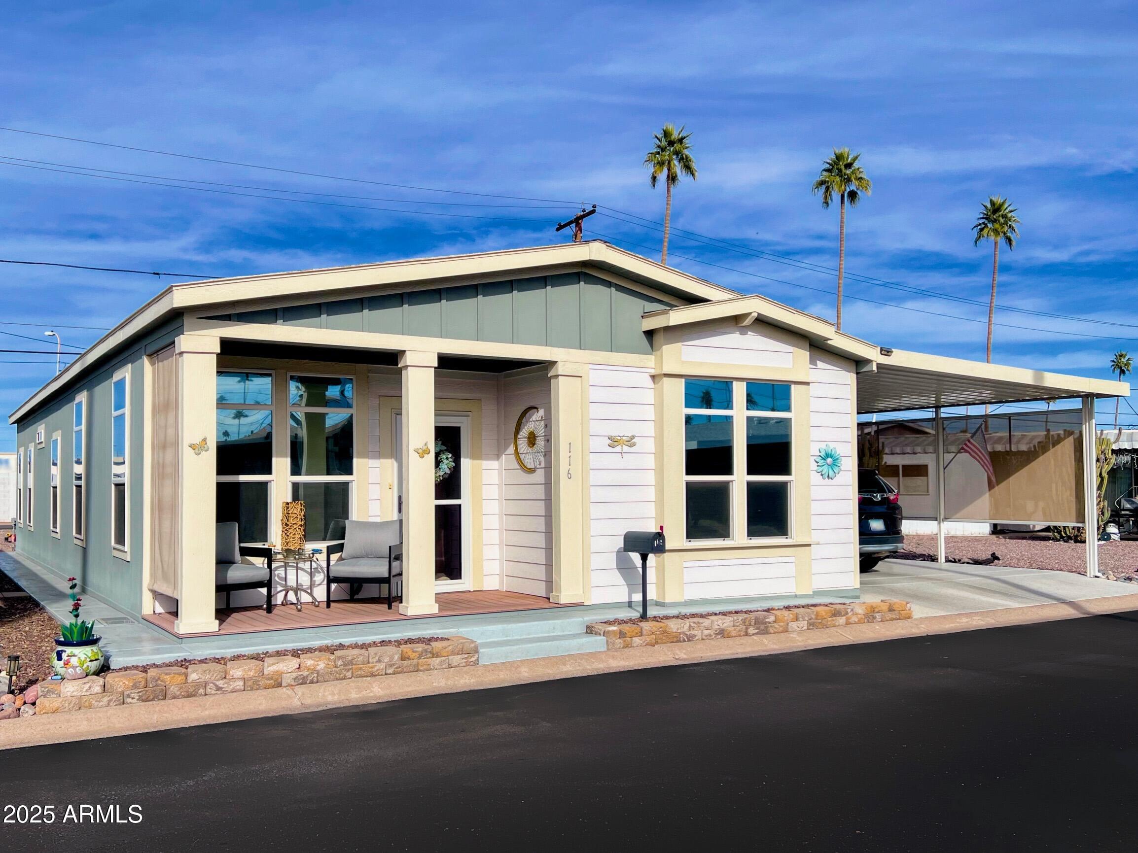 2929 East Main Street, Unit 116 Mesa, AZ 85213 - Photo 2 of 39 a front view of a house with a outdoor space