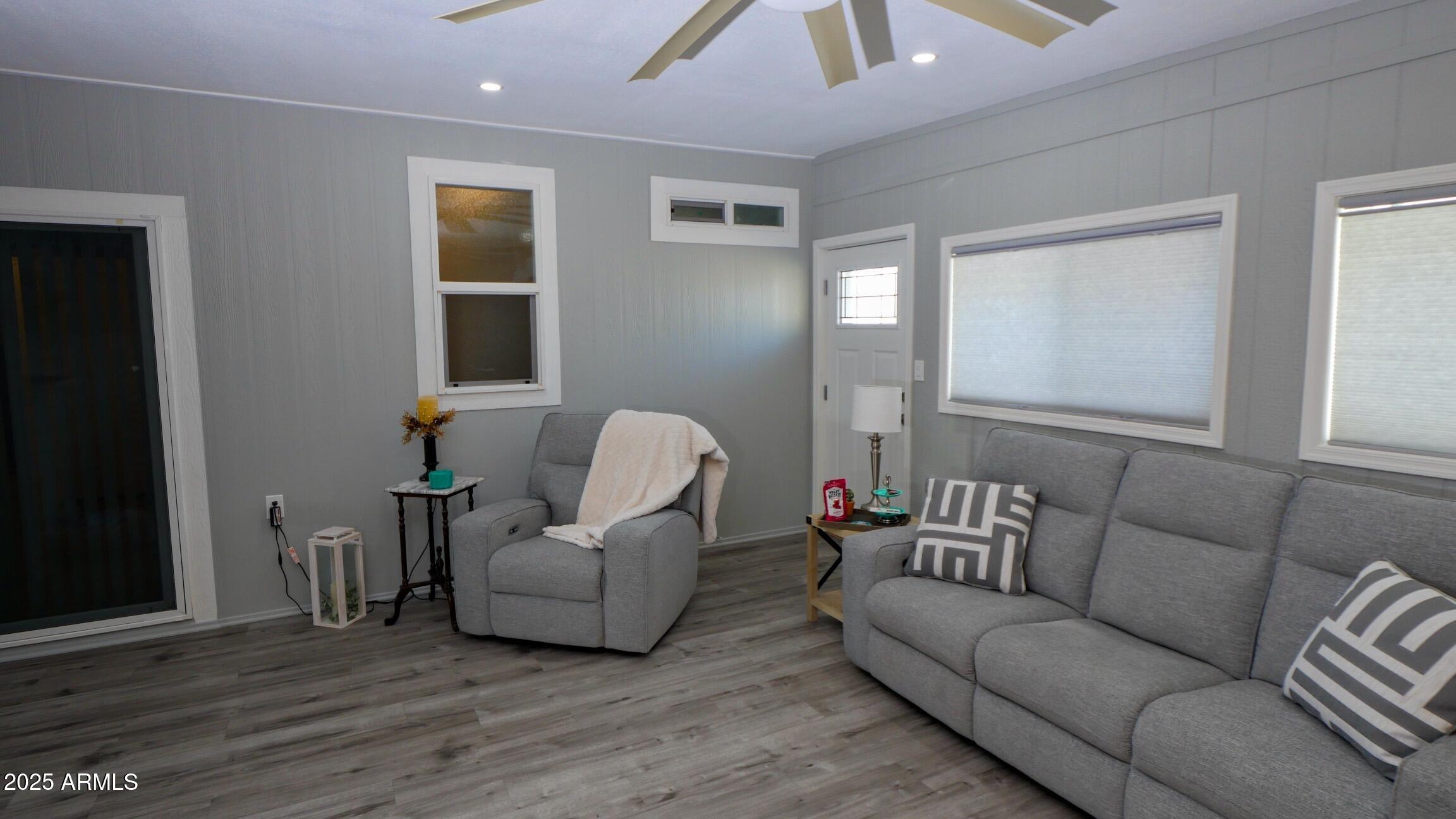 2929 East Main Street, Unit 116 Mesa, AZ 85213 - Photo 30 of 39 a living room with furniture and a window