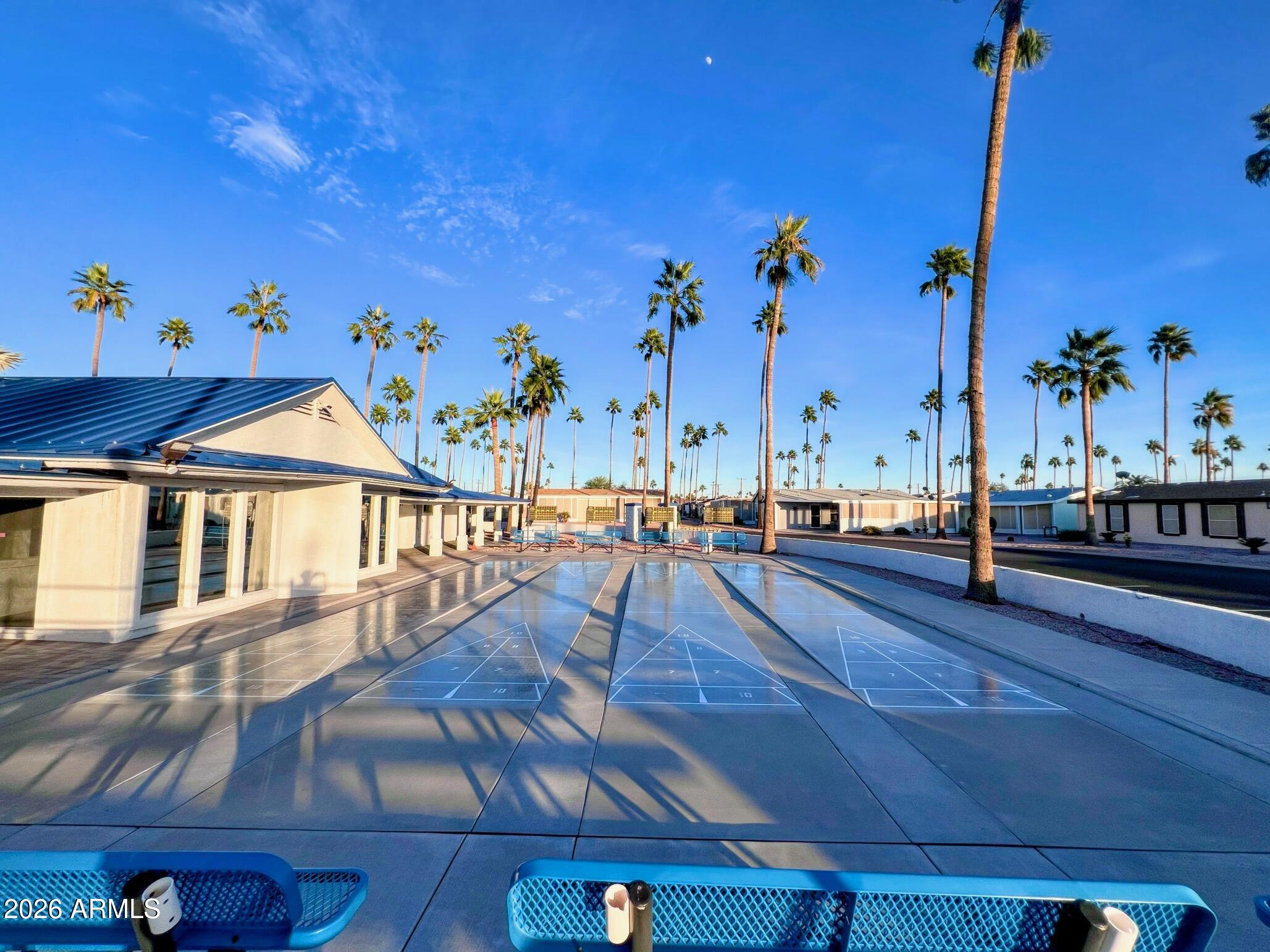 2929 East Main Street, Unit 116 Mesa, AZ 85213 - Photo 37 of 39 a view of a swimming pool with lounge chair