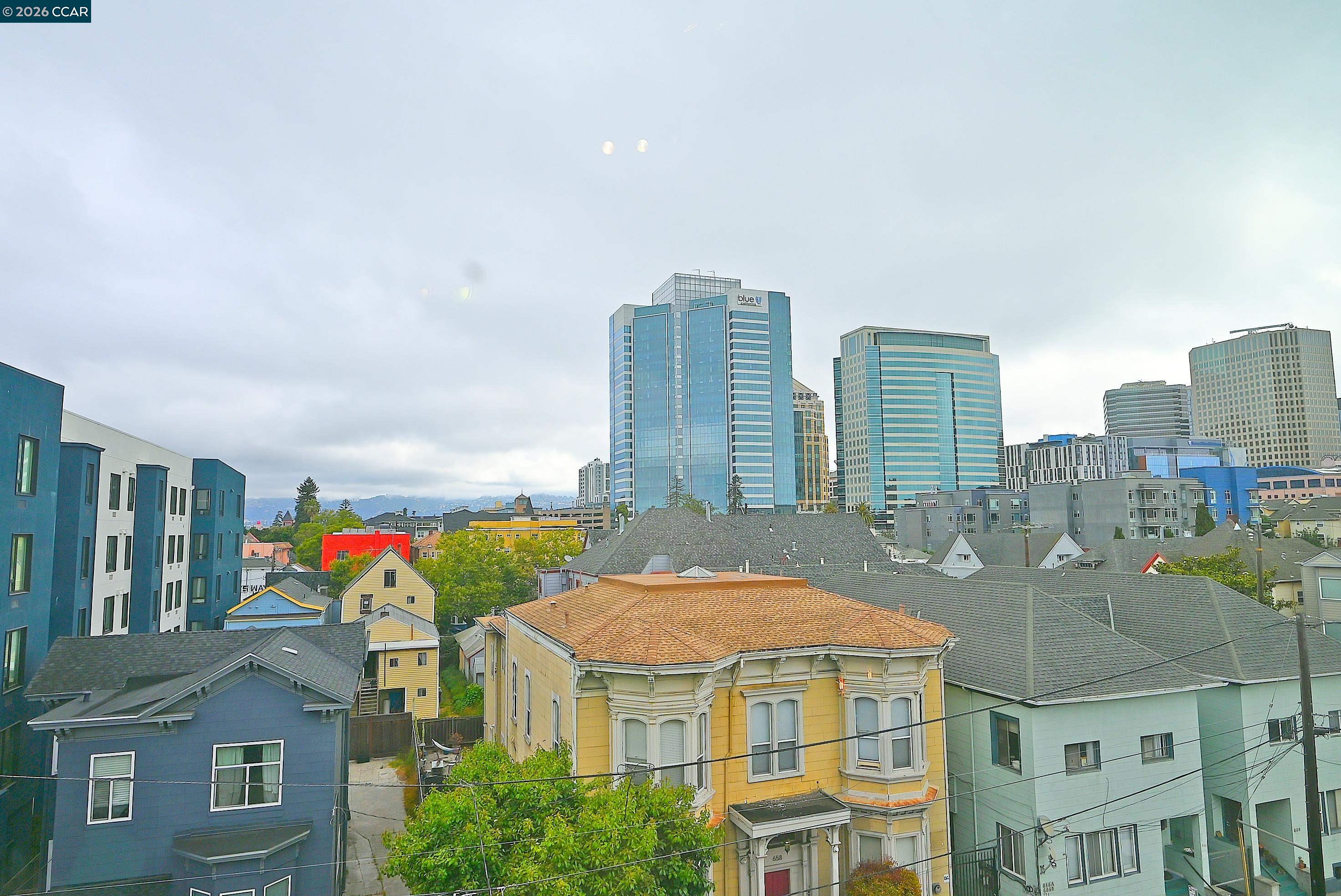 675 8th Street, Unit 15 Oakland, CA 94607 - Photo 35 of 38 a view of city with tall buildings
