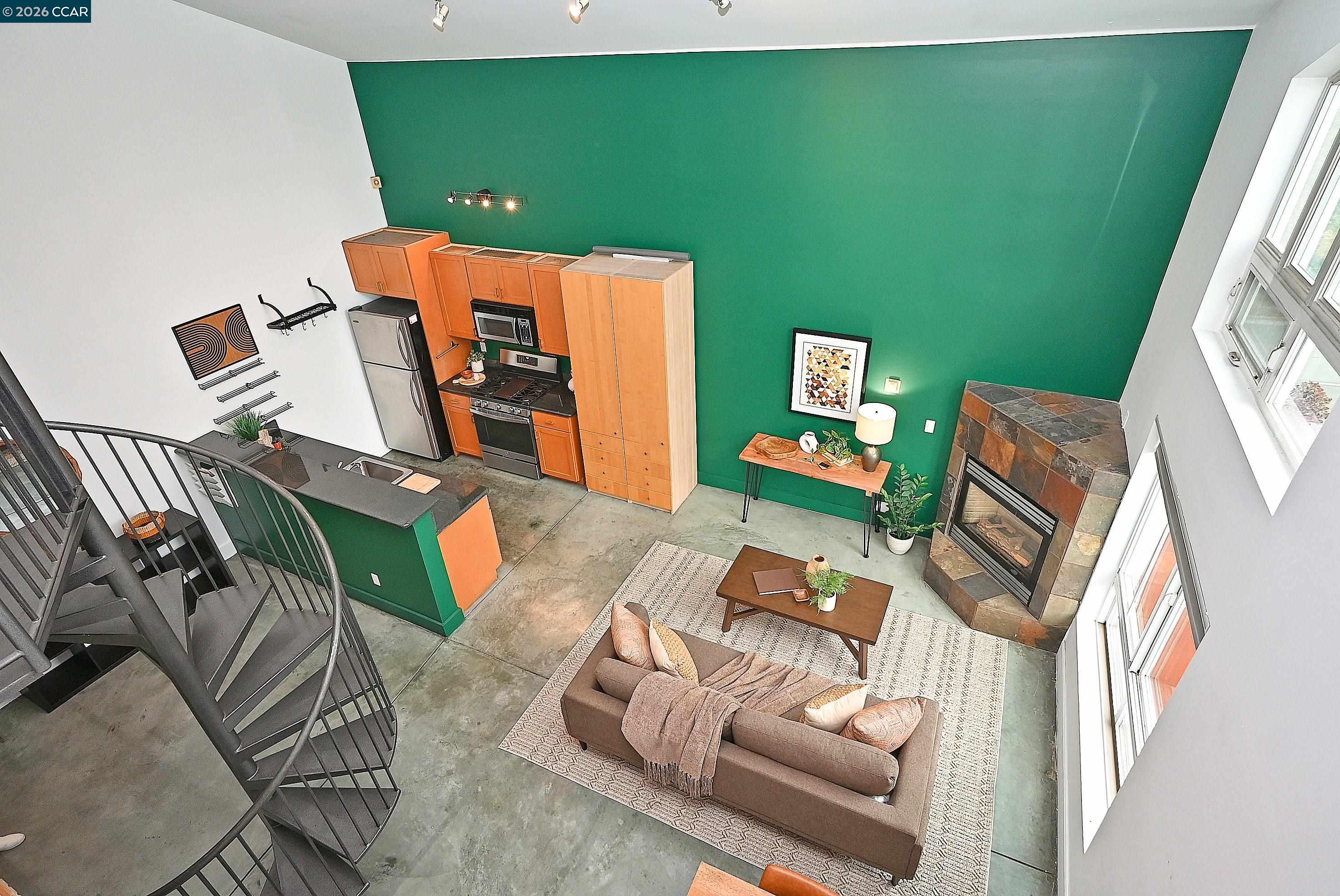 675 8th Street, Unit 15 Oakland, CA 94607 - Photo 4 of 38 an outdoor living room with furniture