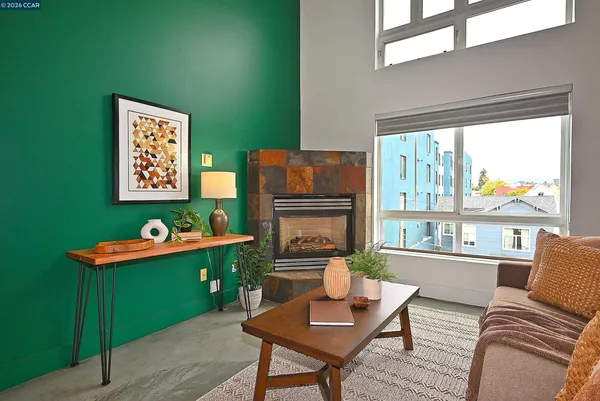 a living room with furniture and a gate