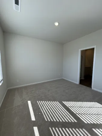 a view of a livingroom with a staircase