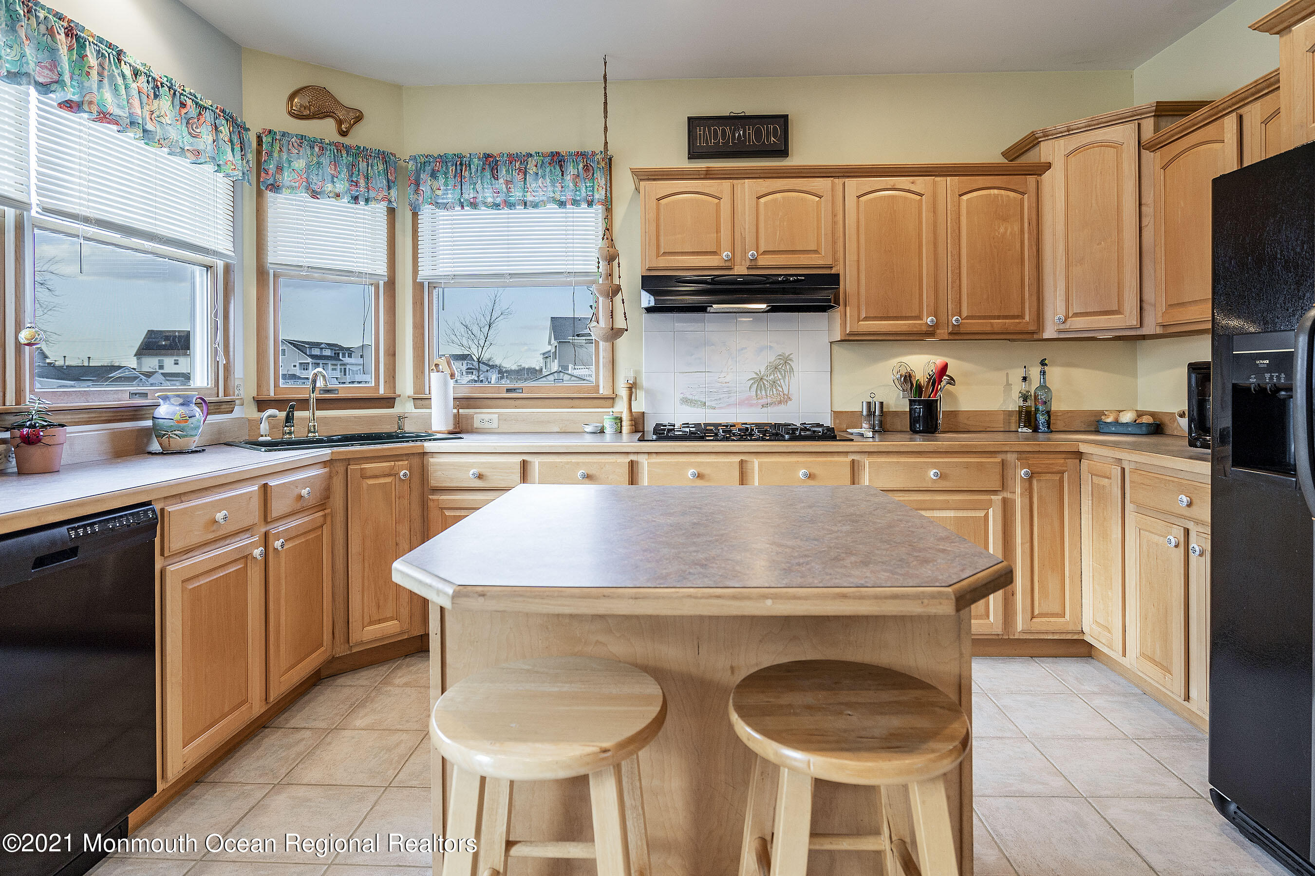 9 Sands Point Road Waretown, NJ 08758 - Photo 22 of 70 a kitchen with stainless steel appliances granite countertop a sink a stove and cabinets