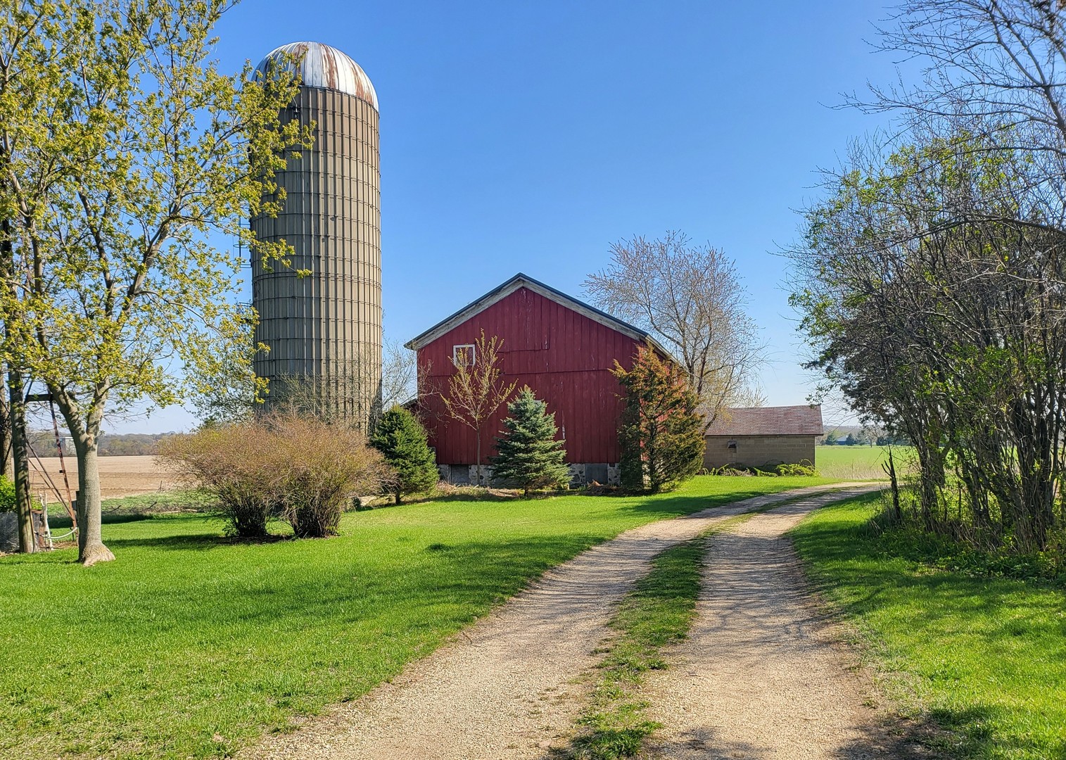 W8479 Townline Road Whitewater, WI 53190 - Photo 1 of 8 a view of a big building with a big yard and large trees