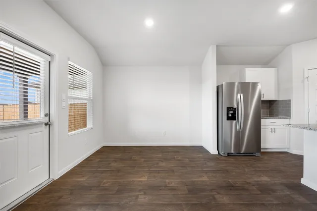 a view of a storage & utility room with closet