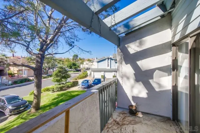 a view of a building with a yard