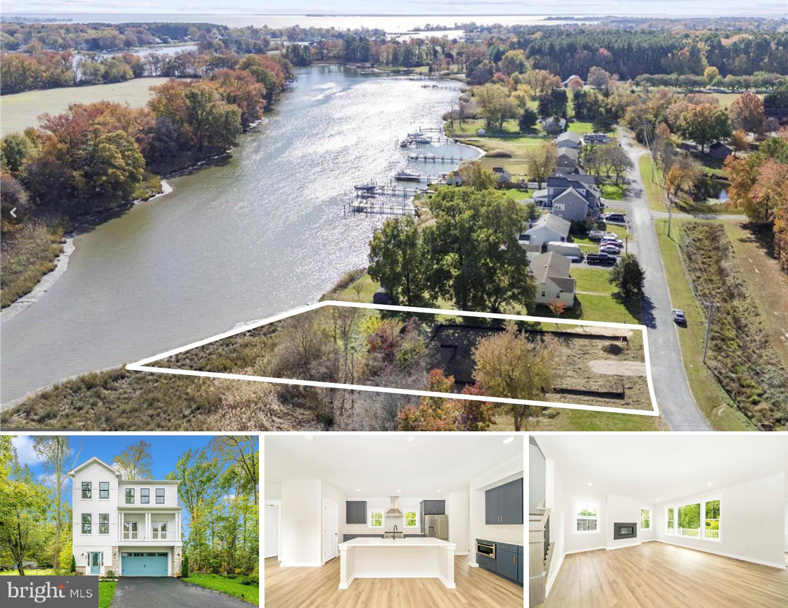 an aerial view of residential houses with outdoor space and river