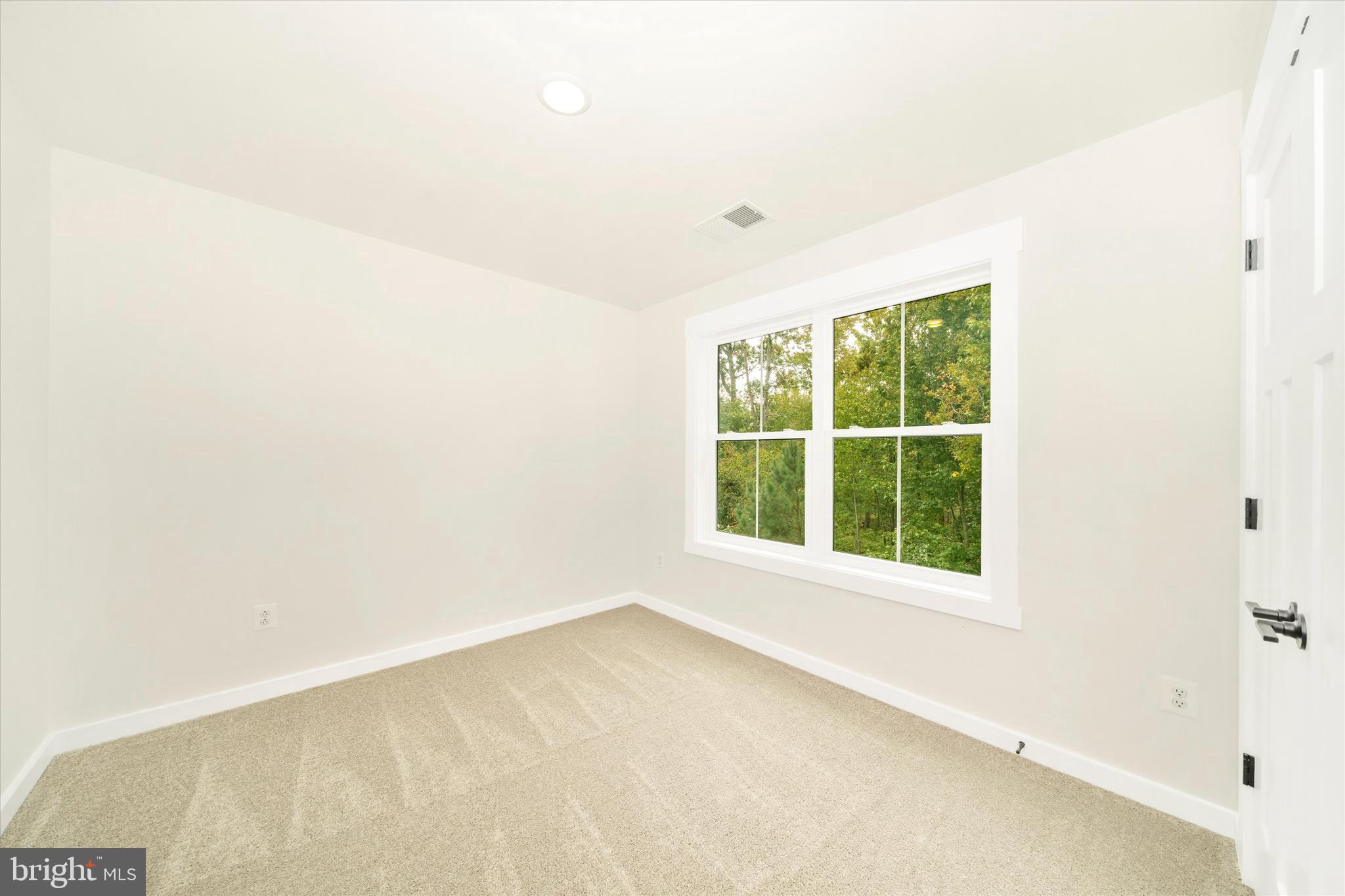 203 Riverside Drive Chester, MD 21619 - Photo 49 of 68 an empty room with a window