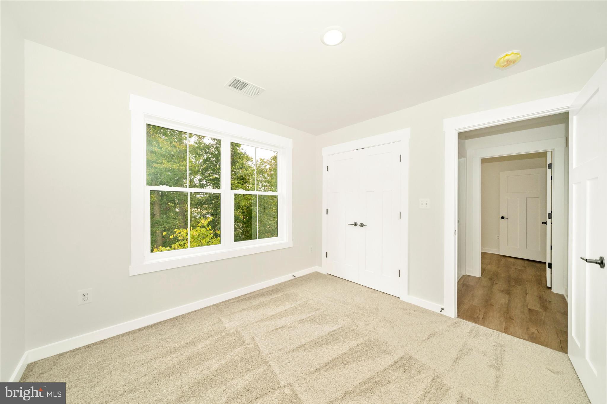 203 Riverside Drive Chester, MD 21619 - Photo 50 of 68 an empty room with a window
