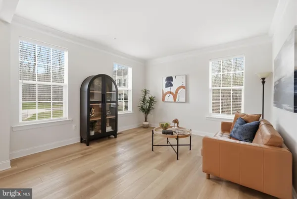 a bathroom with a toilet a sink and a mirror