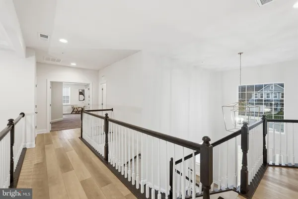 a living room with furniture and white walls