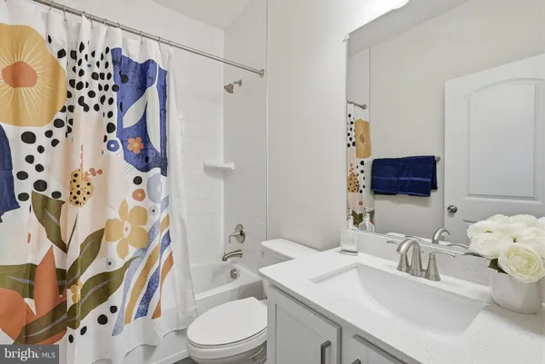 a view of livingroom with furniture and flat screen tv