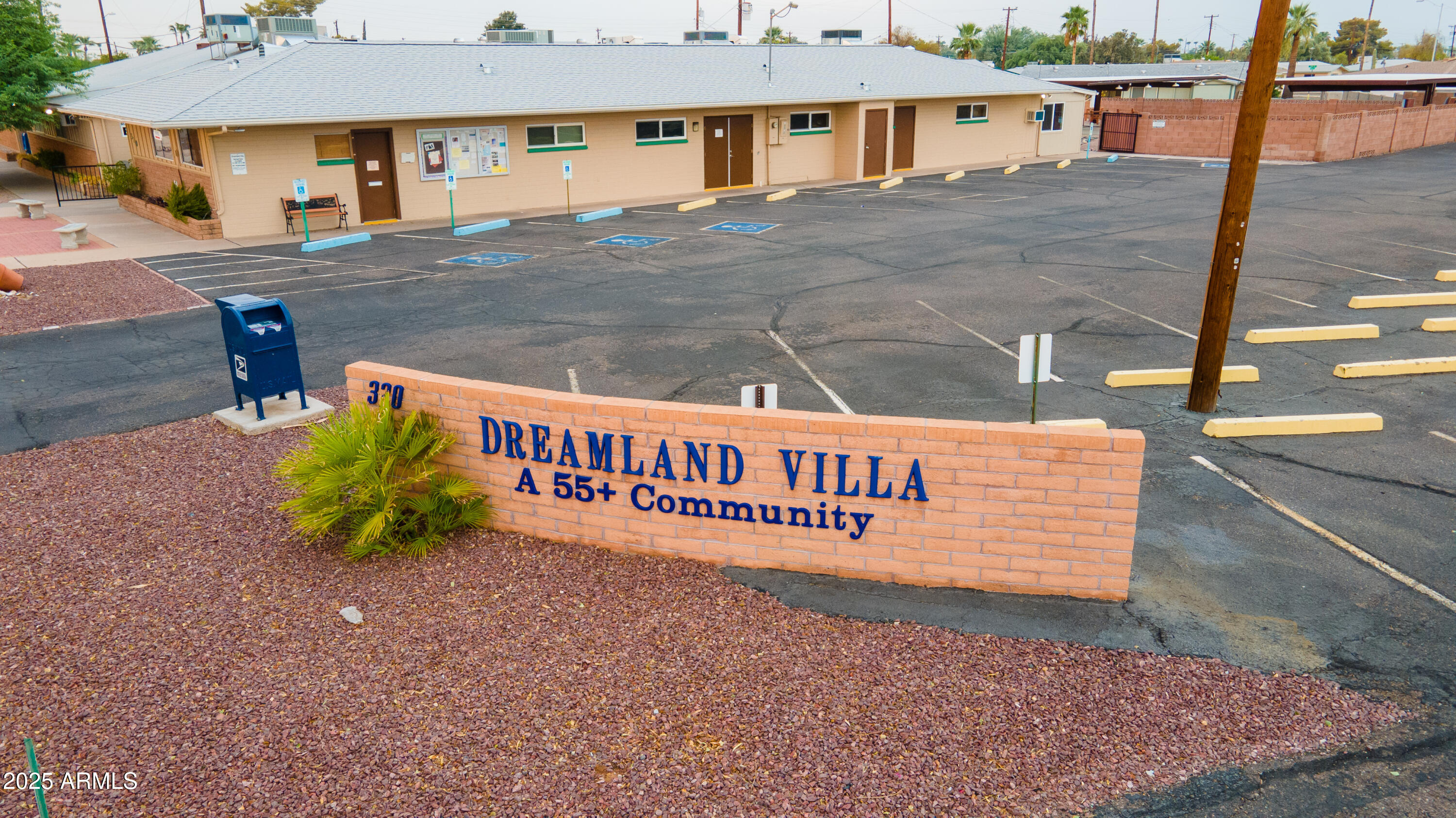 6256 East Decatur Street Mesa, AZ 85205 - Photo 2 of 28 a view of a street with sign board