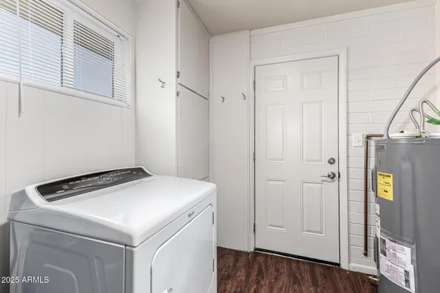 a utility room with washer and dryer