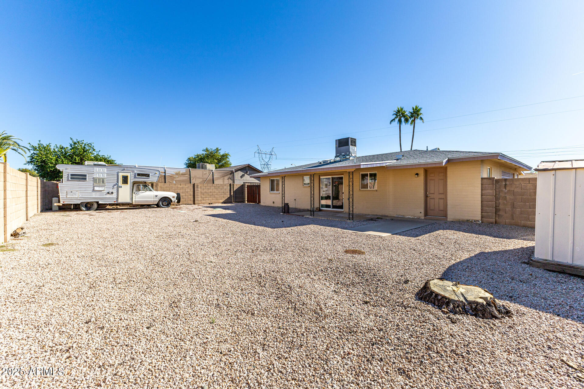 6256 East Decatur Street Mesa, AZ 85205 - Photo 5 of 28 a view of a house with a outdoor space