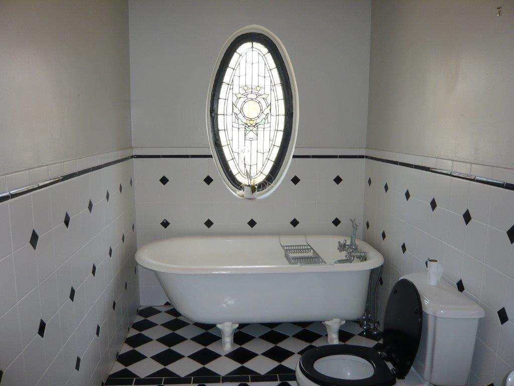 632 Blackburn Road Sewickley, PA 15143 - Photo 11 of 16 Second floor full bath. Stained glass window. Relax and renew