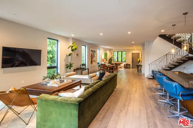 a view of a living room and dining room