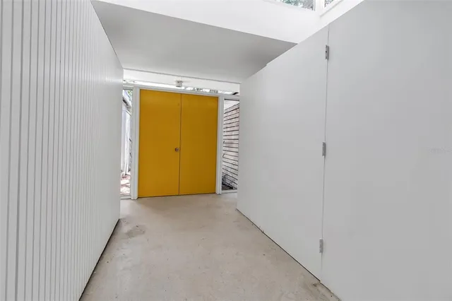 a view of a room with a hallway