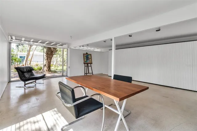 a workspace with furniture and a table