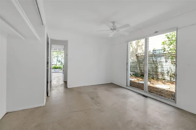 an empty room with windows