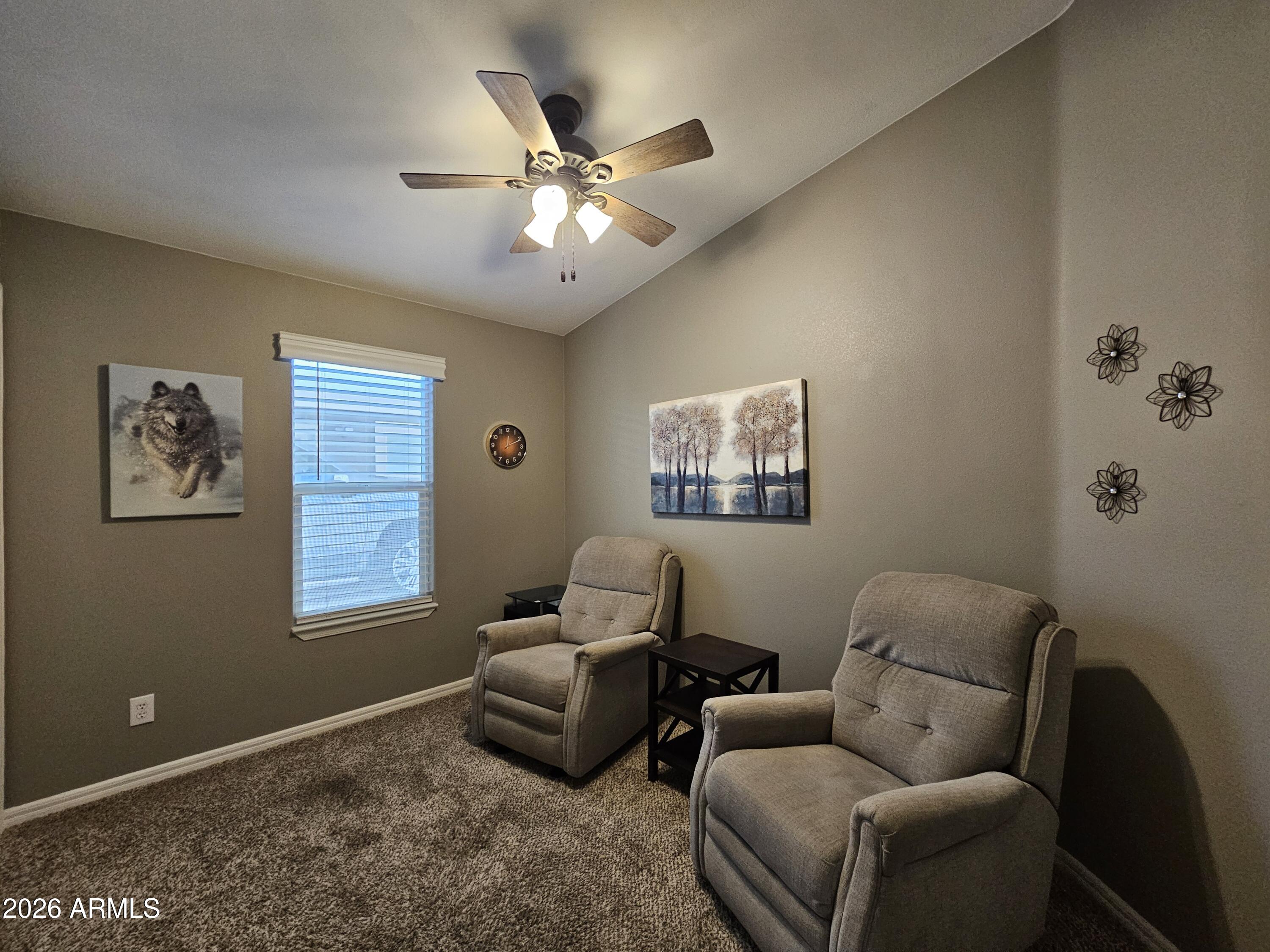 650 North Hawes Road, Unit 3516 Mesa, AZ 85207 - Photo 20 of 37 a living room with furniture and a window