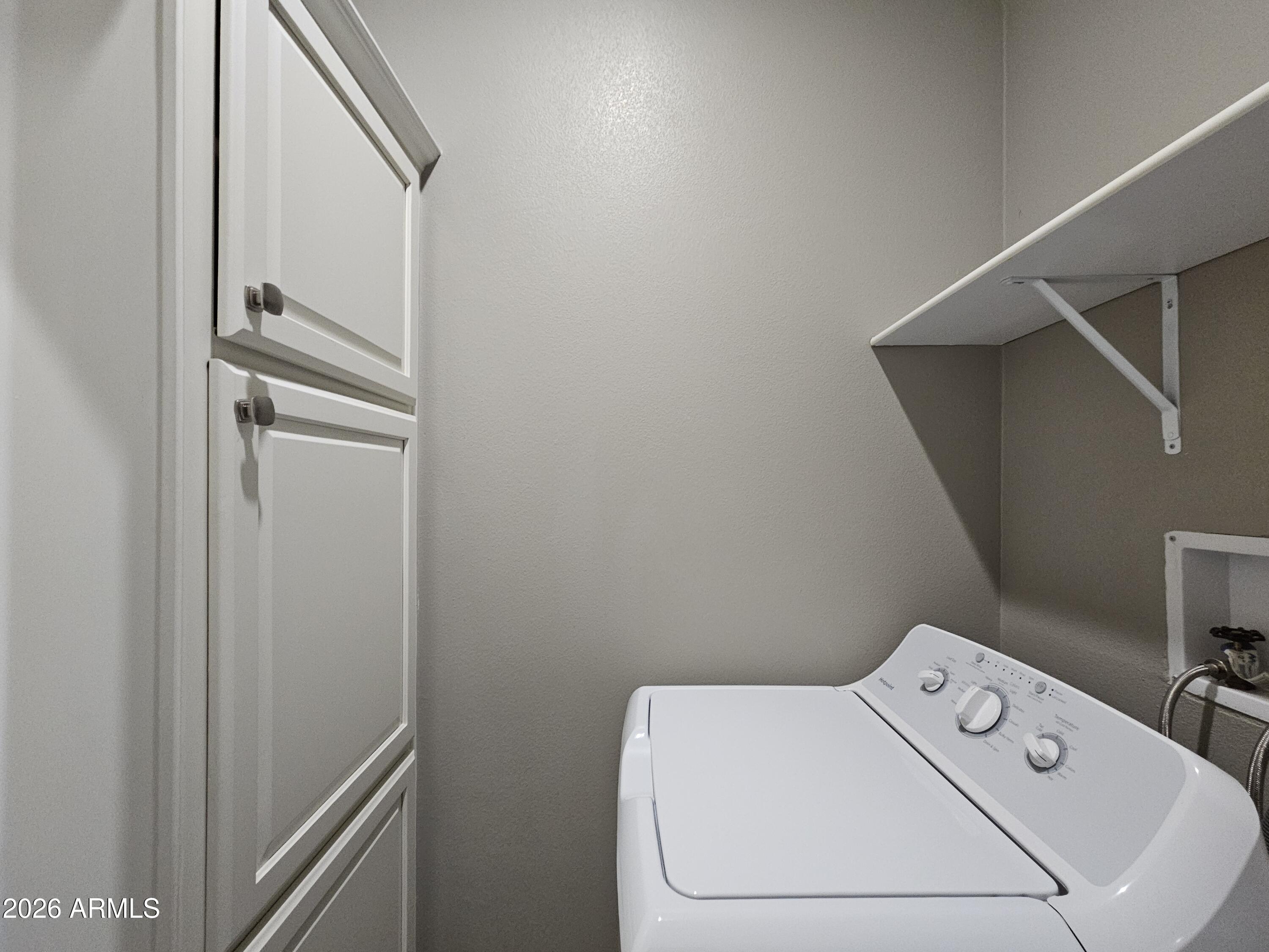 650 North Hawes Road, Unit 3516 Mesa, AZ 85207 - Photo 25 of 37 a utility room with dryer and washer