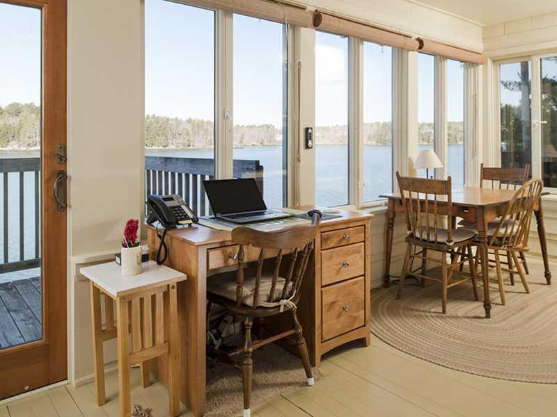 487 Cross Point Road Edgecomb, ME 04556 - Photo 9 of 35 Sunroom. The northwest end of the...