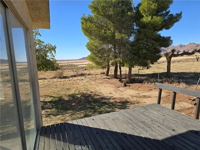 a view of top of the house with a mountain