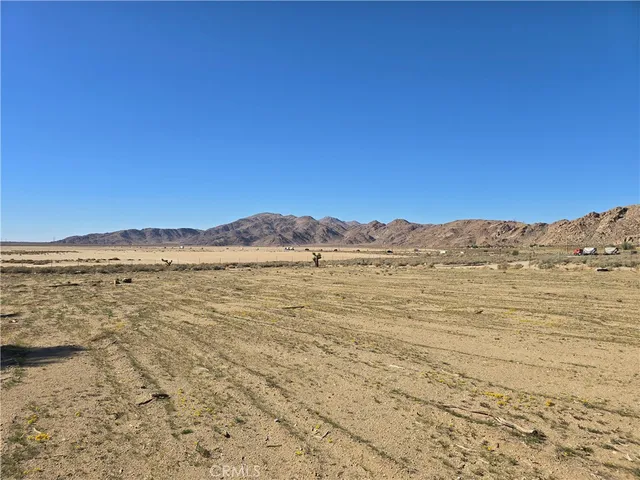 a view of top of the house with a mountain