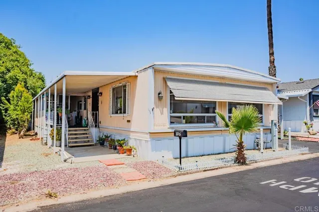 a view of a house with a patio