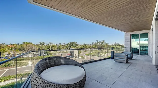 a view of kitchen with seating area and livingroom