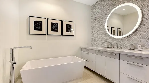 view of a bathroom with a sink and mirror