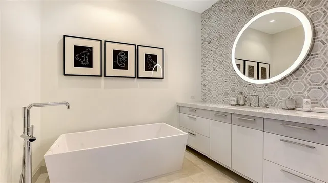 view of a bathroom with a sink and mirror
