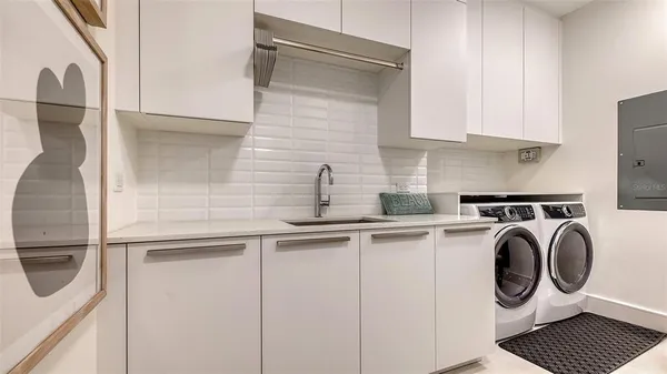 a table with chairs and window