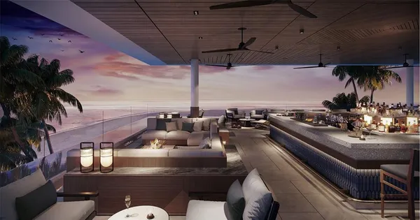 a living room with furniture and a dining table