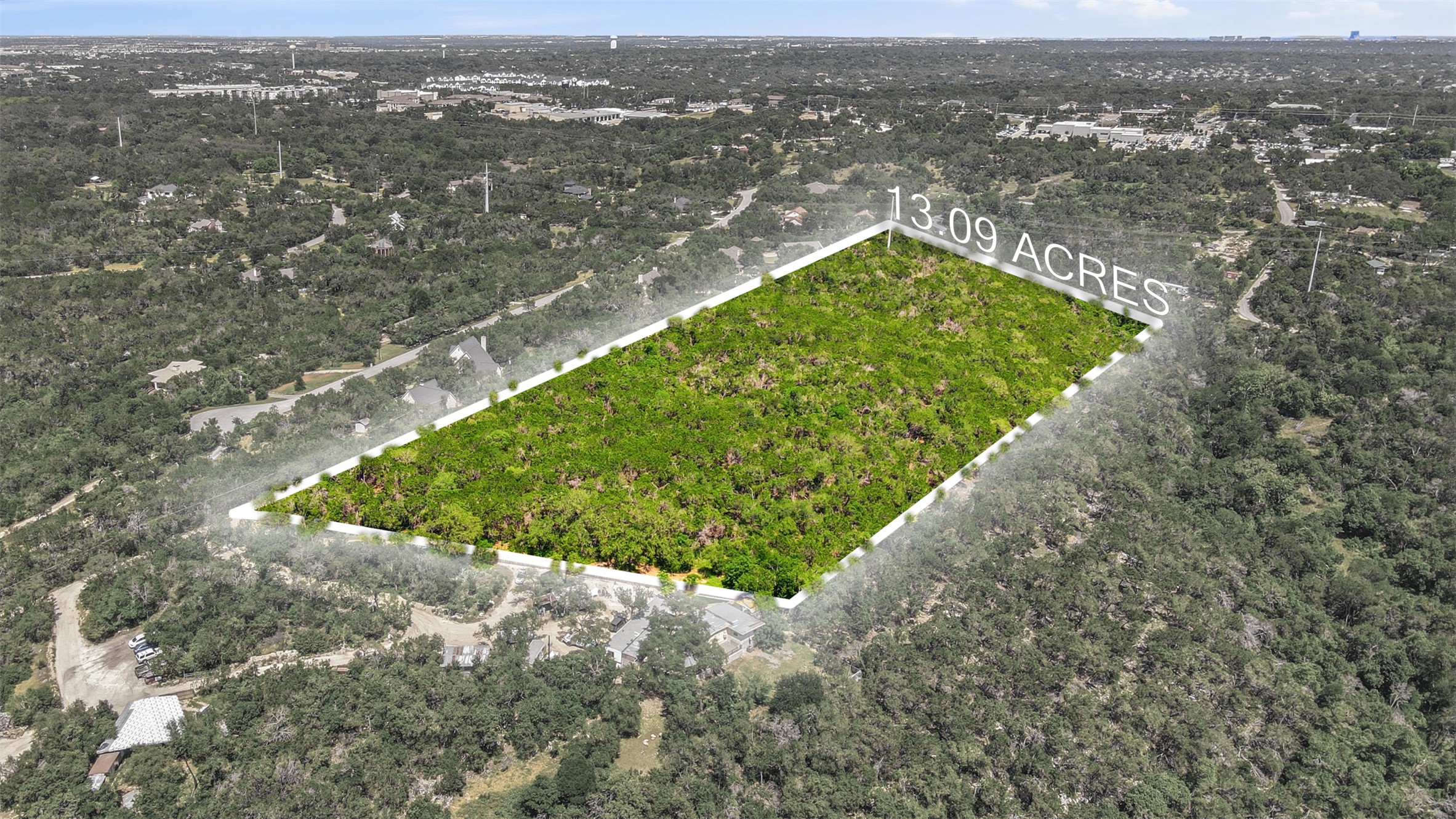 0 North Ranch Road 620 Road Austin, TX 78726 - Photo 1 of 20 a view of a lake with a city