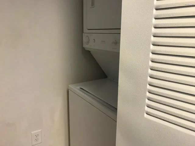 a utility room with washer and dryer