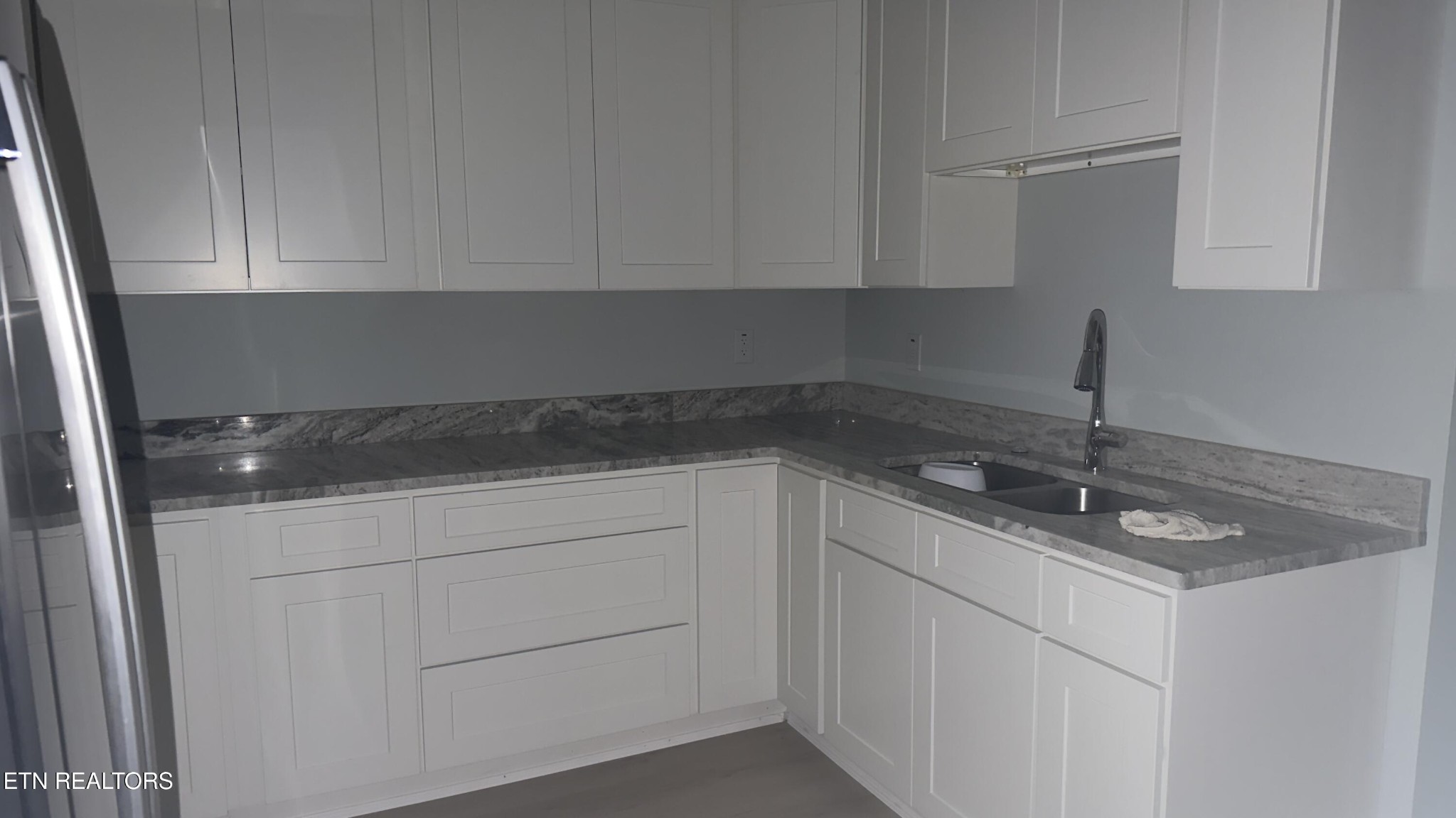 2662 Louisville Road Maryville, TN 37801 - Photo 57 of 60 a kitchen with a sink and cabinets
