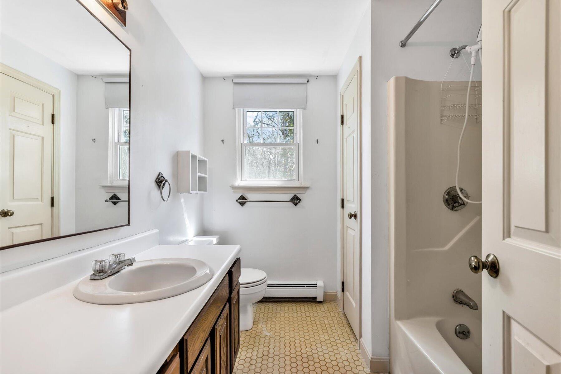 5 Briar Patch Road Osterville, MA 02655 - Photo 22 of 29 a bathroom with a sink toilet tub and shower