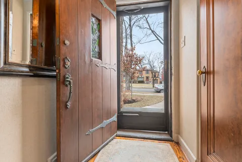 a view of walk in closet and bathroom