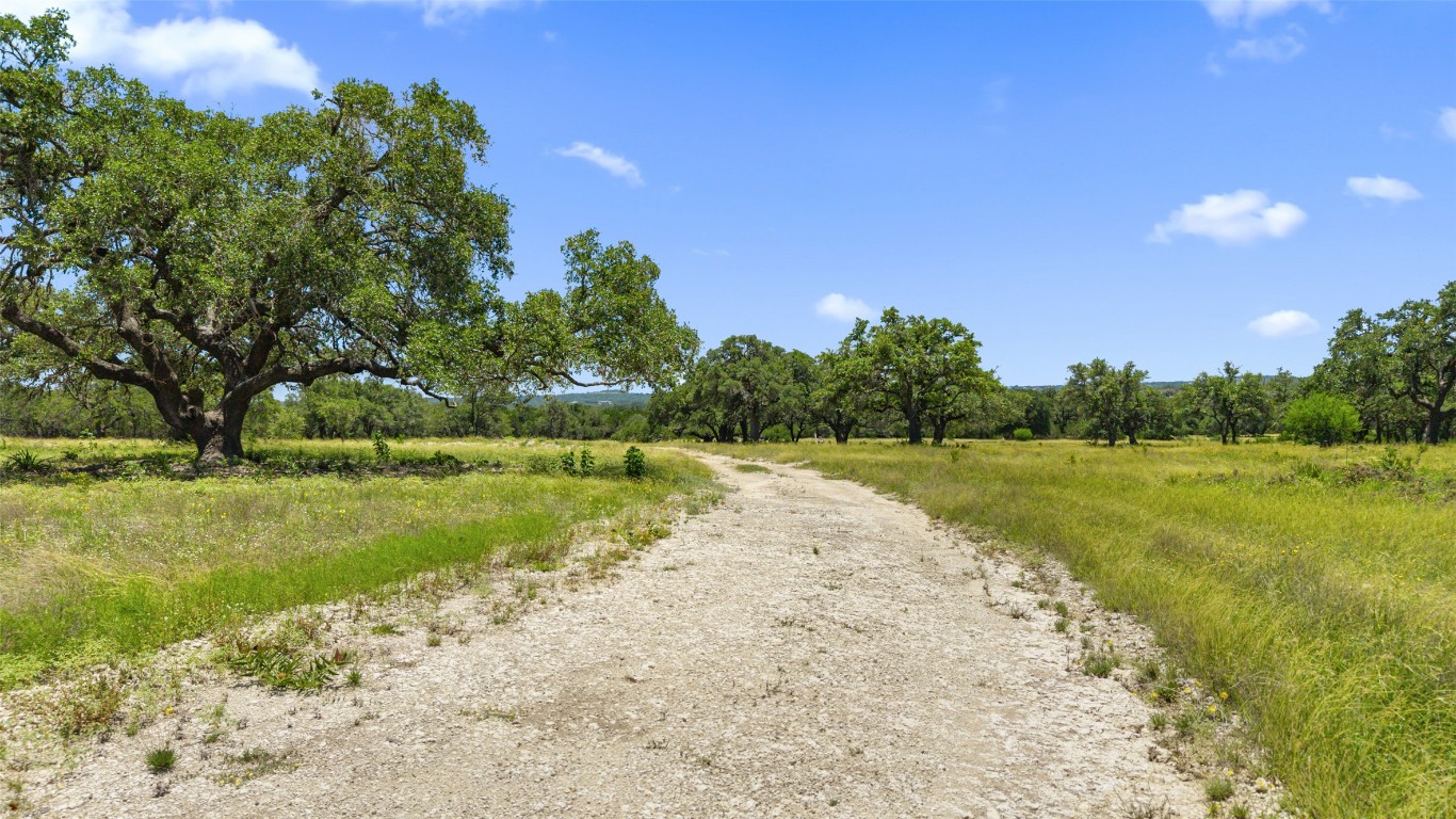 2 Lindeman Lane Blanco, TX 78606 - Photo 2 of 12 a view of a lake with a big yard