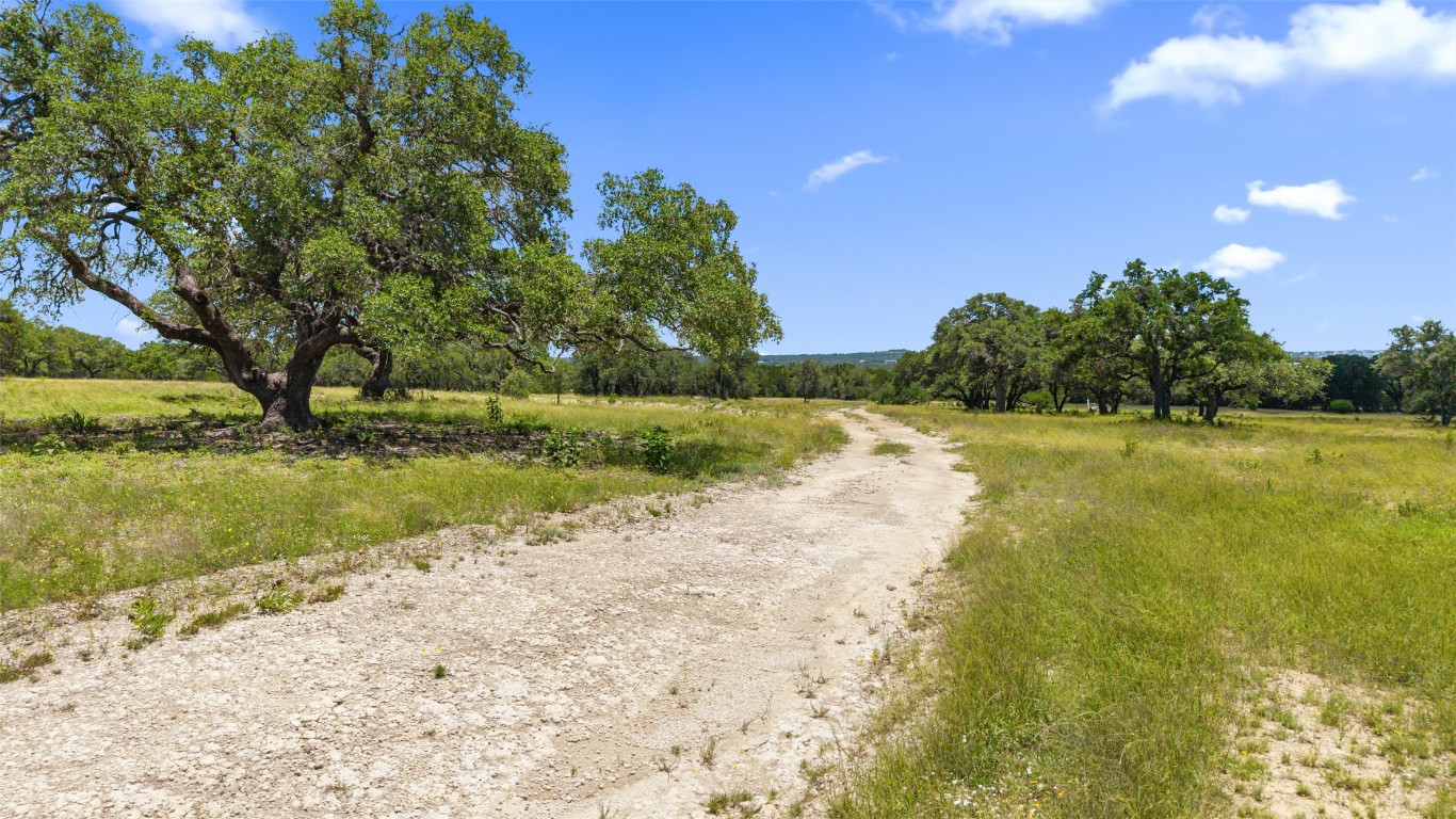 2 Lindeman Lane Blanco, TX 78606 - Photo 5 of 12 a view of a lake with a yard