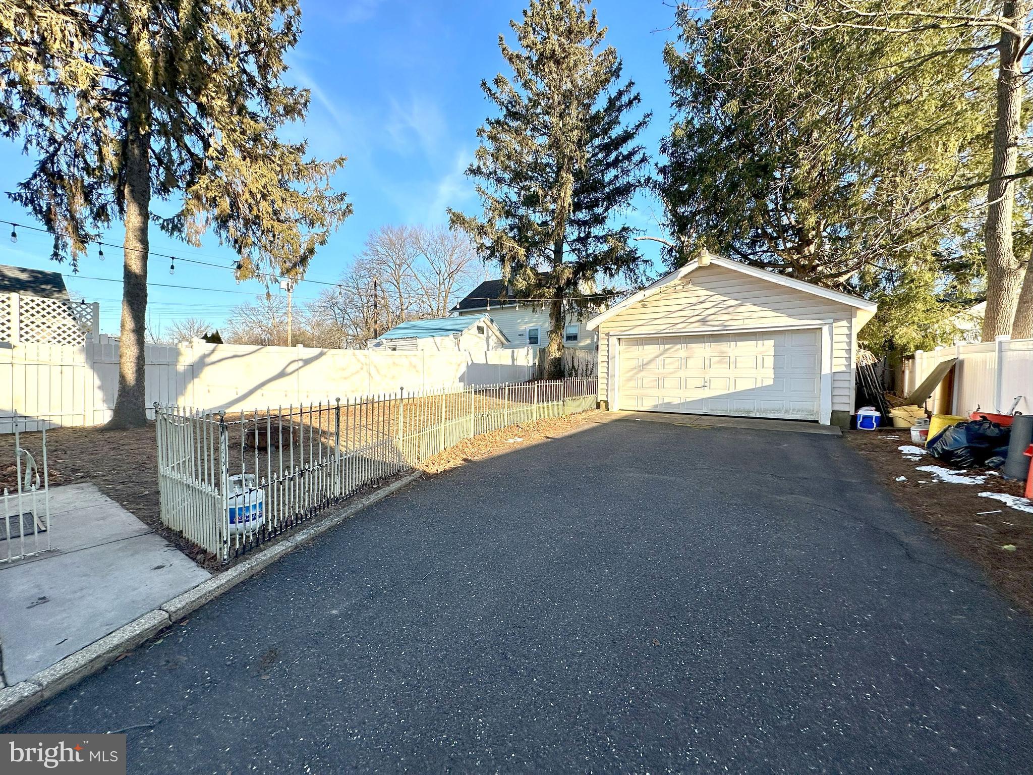 307 Grant Avenue Pitman, NJ 08071 - Photo 16 of 19 a view of a house with a yard and tree s