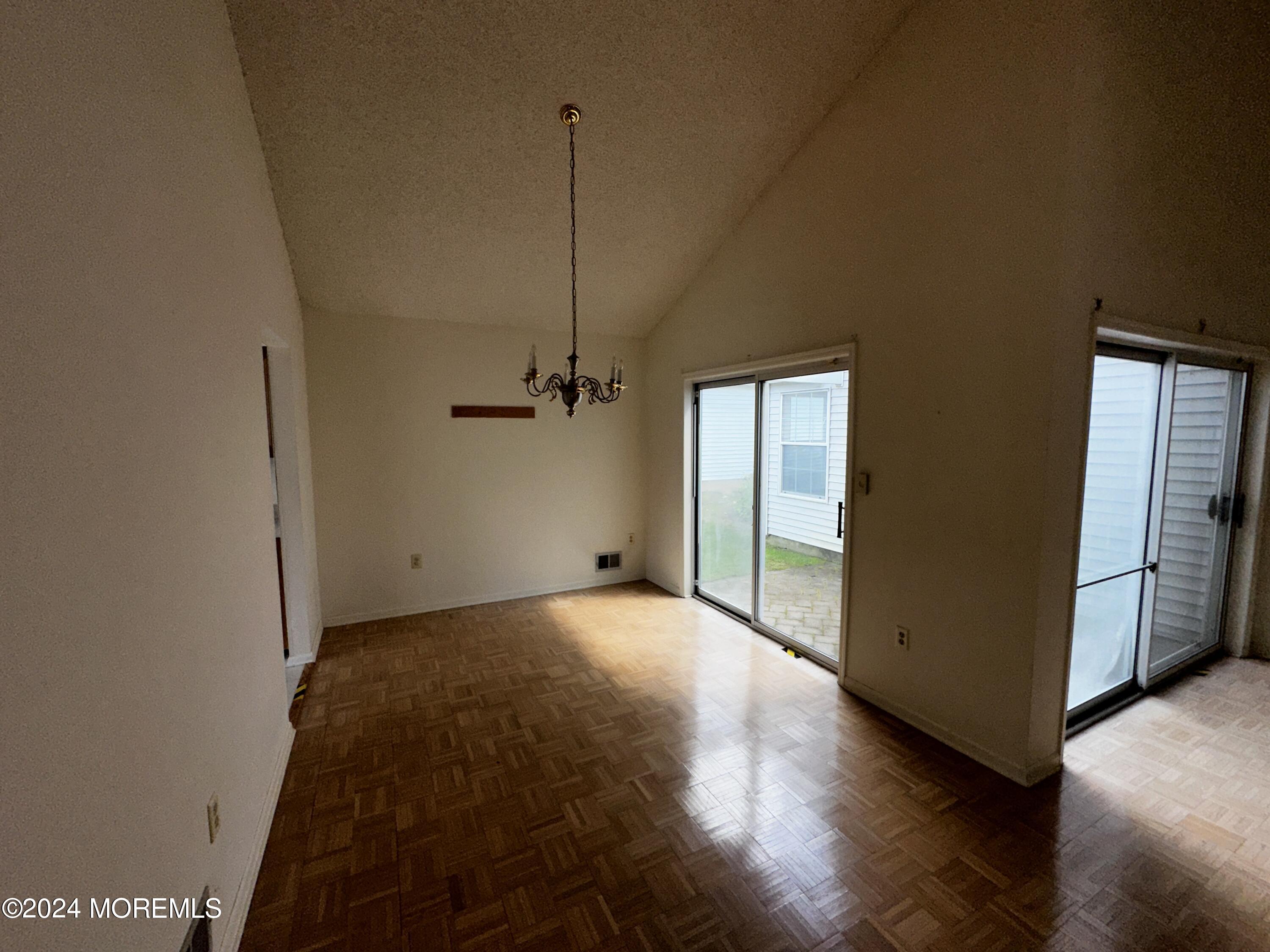 101 Almond Road Freehold, NJ 07728 - Photo 12 of 12 a view of an empty room with a window