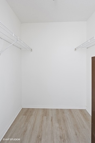 360 East Randolph Street, Unit 1002 Chicago, IL 60601 - Photo 15 of 18 a view of an empty room