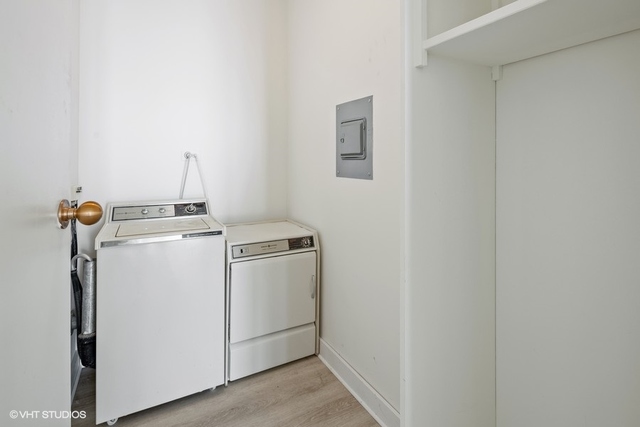 360 East Randolph Street, Unit 1002 Chicago, IL 60601 - Photo 18 of 18 a utility room with dryer and washer