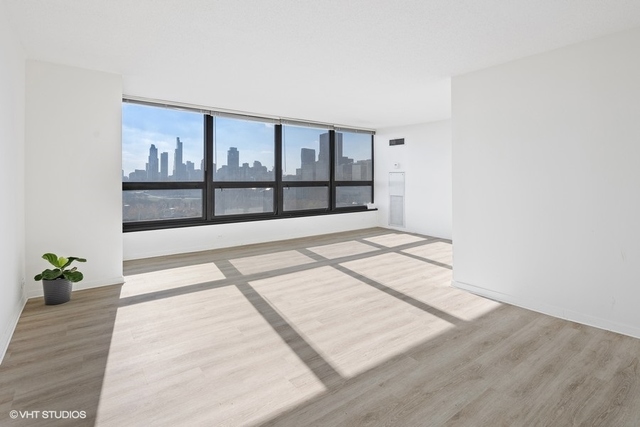 360 East Randolph Street, Unit 1002 Chicago, IL 60601 - Photo 8 of 18 a view of wooden floor
