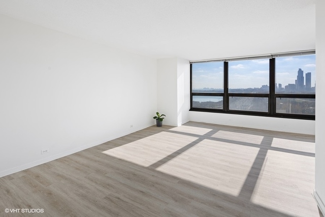 360 East Randolph Street, Unit 1002 Chicago, IL 60601 - Photo 10 of 18 wooden floor in a room